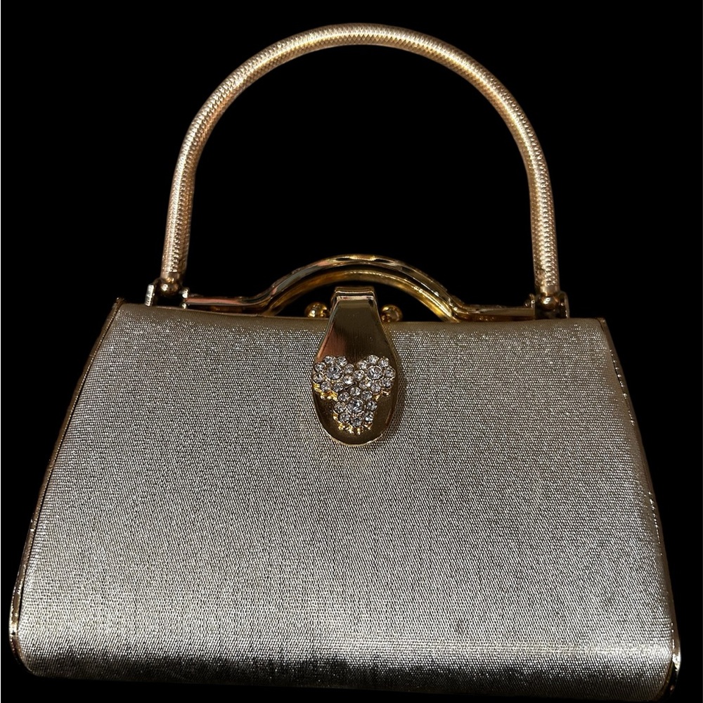 Elegant Silver Handbag with Gold Accents